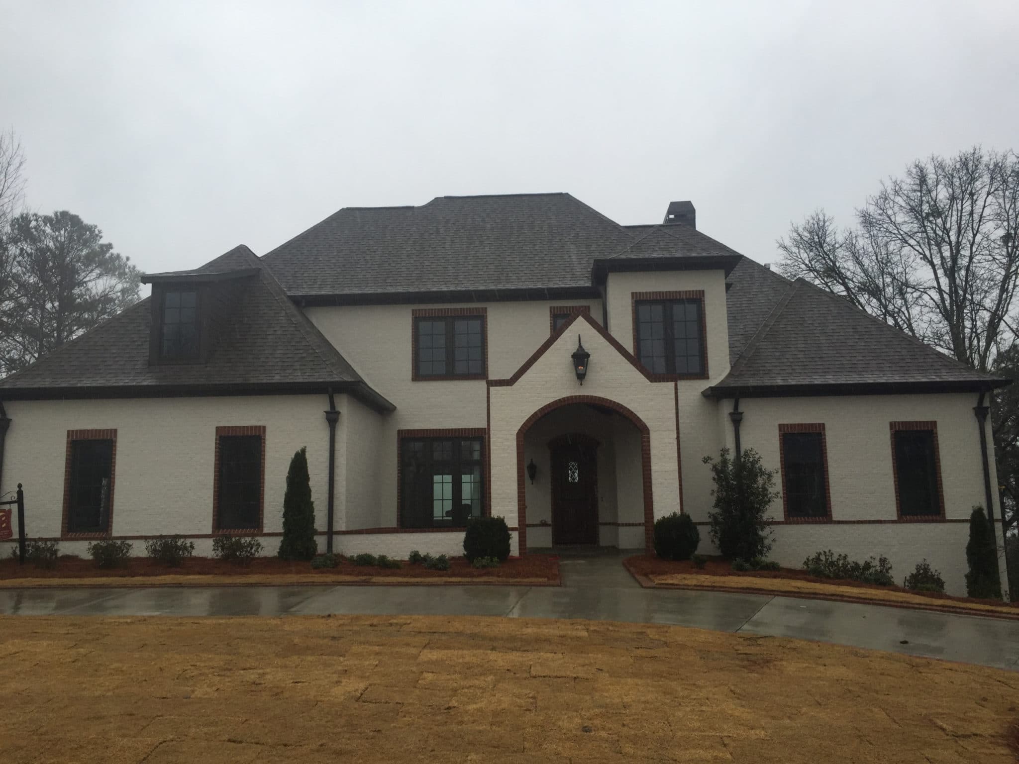 front of large custom built home from Taylor Burton Company